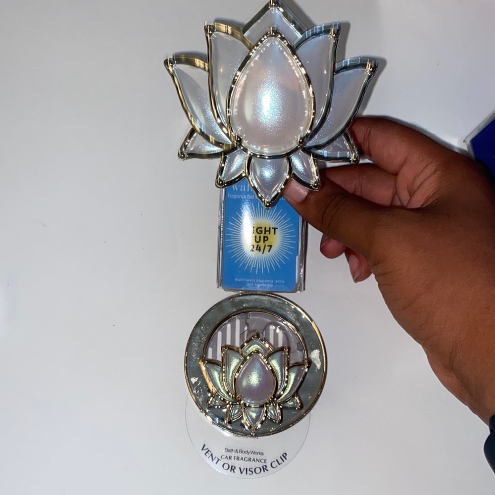 This is a car fragrance holder and a wall fragrance holder for the home.